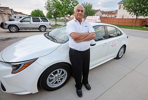 JOHN WOODS / FREE PRESS
Lek Kinnarath, driving instructor and owner of Maple Leaf Driving School, is photographed with his training car in Winnipeg Tuesday, June 3, 2025. 

Reporter: matt