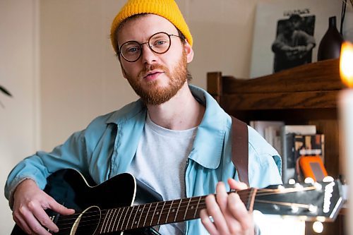 MIKAELA MACKENZIE / WINNIPEG FREE PRESS
Dylan MacDonald, a singer-songwriter who is releasing his album (Field Guide) tomorrow, poses for a portrait in his home in Winnipeg on Thursday, Oct. 27, 2022. For Ben Waldman story.
Winnipeg Free Press 2022.