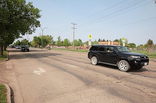 Vehicles drive along 26th Street near Park Avenue in Brandon. Reconstruction work on a four-block stretch of the road between Park and Victoria avenues is set to begin next month, but a dedicated bike lane will not be part of the design.(Tim Smith/The Brandon Sun files)