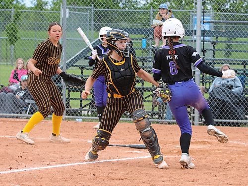 Under-15 AAA Westman Magic catcher Rachel Lyver of Brandon tags out Central Energy base runner Kennedy Funk of Morden (8), who was caught in a rundown after a bunt during the inaugural Wheat City Classic at Ashley Neufeld Softball Complex last June. Third baseman Kaylee Rank of Brandon (15) watches in the background after charging in to field the ball on the initial play. Central earned the victory and went on to lose in the tournament final. (Perry Bergson/The Brandon Sun)