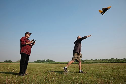 05062025
Ian Fraser launches Hugh Fraser’s electric-motor-powered Lippisch RC plane while Hugh operates the radio controls at the Brandon RC Flying Club field east of Brandon on Thursday morning. 
(Tim Smith/The Brandon Sun)