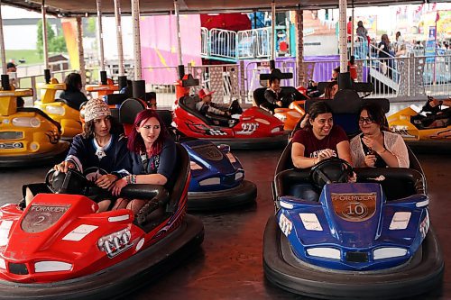 05062025
Fair-goers collide bumper cars during a sunny Thursday evening at the Manitoba Summer Fair at the Keystone Centre grounds.
(Tim Smith/The Brandon Sun)