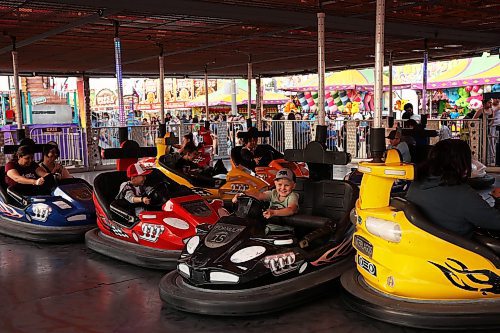 05062025
Fair-goers collide bumper cars during a sunny Thursday evening at the Manitoba Summer Fair at the Keystone Centre grounds.
(Tim Smith/The Brandon Sun)