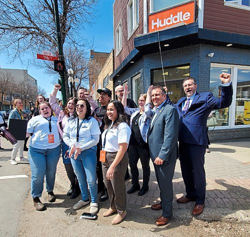 In this 2022 file photo, several youth advisors and invited guests attend the official opening of Huddle in downtown Brandon. The province has announced $400,000 to support the expansion of Huddle to Portage La Prairie. (Karen McKinley/Brandon Sun file photo)