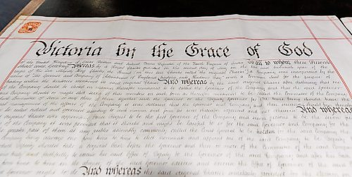 MIKE DEAL / FREE PRESS
Supplementary Charter 1884: A.37/21
The Hudson’s Bay Company Archives currently holds all nine original supplementary charters which were signed to amend the 1670 Charter of Incorporation. By the 1880s, the HBC found that its incorporating charter was inadequate for the conduct of its modern business, especially in regards to land sales. The HBC petitioned the crown for supplemental charters, the first of which was granted in 1884. The HBCA holds the original petitions to the crown for each charter. These supplementary charters, once signed, annulled the supplements and original charter that came before it. There are supplementary charters for 1884, 1892, 1912, 1920, 1949, 1957, 1960, 1963 and 1970. There are two versions of the 1970 supplementary charter, as this charter specifically made the HBC a Canadian rather than a British Company, one signed in the UK and one in Canada on May 29, 1970. All of the supplementary charters arrived at and were held by the Archives Department of the HBC in London, being received at the Archives shortly after their creation in many cases. These were all donated to the Province of Manitoba in 1994.
Reporter: Conrad Sweatman
250610 - Tuesday, June 10, 2025.