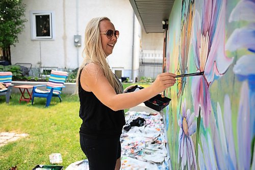 Ruth Bonneville / Free Press
CREATORS - Mural Artist
Photo of Rachel Lancaster, mural artist, as she finishes up a large mural on the side of a garage in a backyard.
Story: 49.8 Creators
Rachel Lancaster is a mural artist. She creates huge artworks to fill empty spaces and has painted walls, garage doors and the exteriors of sea containers.
See story by AV Kitching
June 12th, 2025
