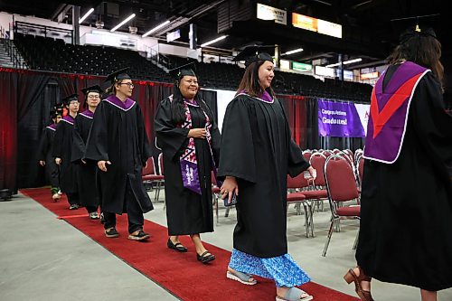 13062025
Graduates enter Westoba Place for the commencement of the Assiniboine College graduation ceremony for the Peters School of Business and Russ Edwards School of Agriculture and Environment on Friday morning.
(Tim Smith/The Brandon Sun)