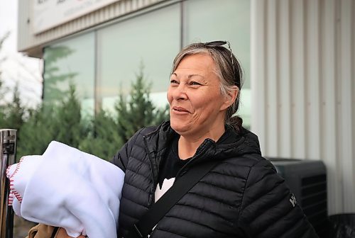 Ruth Bonneville  / Free Press 

Local Evacuees head home

Crystal Miller of Cross Lake is all smiles as she waits outside the Perimeter Airlines airpot before boarding her flight back home Monday. 

Cross Lake evacuees unload from a bus at Perimeter Airlines preparing to head home on several flights Monday.  

June 16th,  2025

 