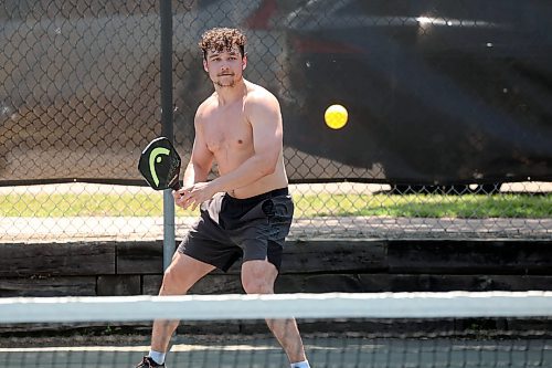 18062025
Calen Addison returns the ball while playing pickleball with friend Chad Nychuk at the Stanley Park pickleball courts on a hot Wednesday afternoon.
(Tim Smith/The Brandon Sun)