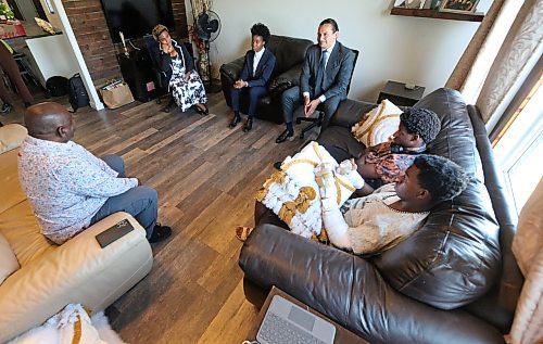 Asagwara and Kinew speak with the Onuke family in their home near Sprucewoods on Thursday afternoon. (Matt Goerzen/The Brandon Sun)