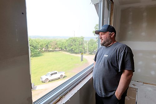 Gregoire looks out towards Pelican Lake from the second story of a former sanitorium building, which will soon be an apartment rental. He and his team have nearly remodelled it after the building had been vacant for the better part of two decades. (Connor McDowell/Brandon Sun)