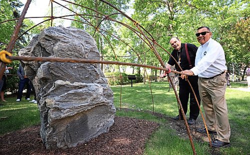 Ruth Bonneville  / Free Press 

LOCAL - Grandfather Rock

 An official  unveiling of M'Shoomisanin, the &#x201c;Grandfather&#x201d; Rock, took place at the Heritage Garden, on the grounds of de la Cath&#xe9;dral after a ceremony with Elder Clayton Sandy and Archbishop Albert LeGatt and other guests Friday. 

The ceremony was part of National Indigenous Peoples' Day, celebrated on June 21st.  


June 20th,  2025

 