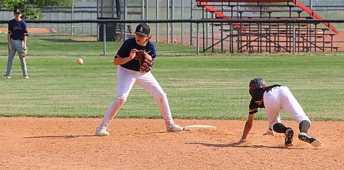 Diamondbacks base runner Noah Hofer (21) dives successfully into second base as Angels shortstop Jacob Shewchuk (8) waits for the throw from the late during Brandon Minor Baseball's annual jamboree on Saturday at Simplot Millennium Park. (Perry Bergson/The Brandon Sun)
June 21, 2025