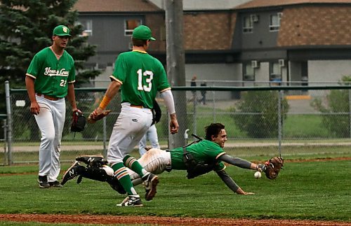 Brandon Young Guns catcher Sawyer Wallin dives for a ball after a short popup by a Virden Oilers batter. Wallin managed to get his glove on the ball but couldn't quite make the catch during his team's South West Baseball League game at Andrews Field on Sunday evening. The Young Guns earned a 25-7 victory. (Perry Bergson/The Brandon Sun)
June 22, 2025