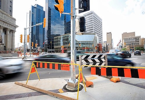 Ruth Bonneville  / Free Press 

LOCAL - Portage &amp; Main opening

Photo of the movement of vehicles through the Portage Ave. and Main Street intersection  for story. 

Feature on the pedestrian crossing opening at the iconic corner of Portage and Main Street after being closed for 46 years.

See story by Ben


June 18th,  2025

 