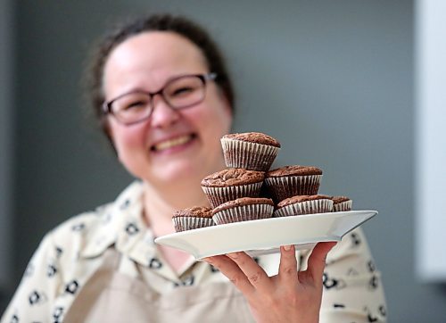 Svetlana Maltseva, owner of TRueFFeeLS in Brandon, holds a plate of chocolate and cherry brownies at Westman Immigrant Services' Entrepreneur Hub on Rosser Avenue in advance of World Chocolate Day on July 7. (Matt Goerzen/The Brandon Sun)