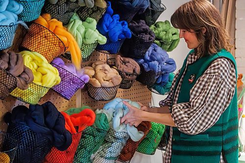 MIKE DEAL / FREE PRESS
Christie pulls some marino wool roving from a basket.
Christie Peters of Margaret Jane Design in her studio.
Christie Peters makes felted flowers and felted vases as well as wall hanging pieces.
Reporter: AV Kitching
250625 - Wednesday, June 25, 2025.