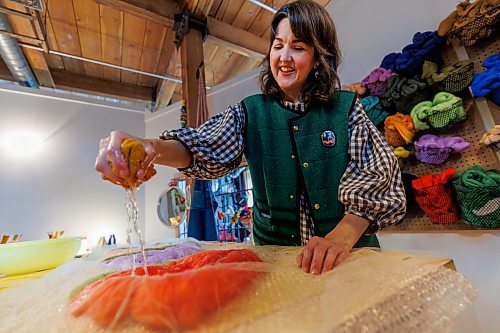 MIKE DEAL / FREE PRESS
Christie squeezes a sponge full of water onto some wool while making Wall Flowers.
Christie Peters of Margaret Jane Design in her studio.
Christie Peters makes felted flowers and felted vases as well as wall hanging pieces.
Reporter: AV Kitching
250625 - Wednesday, June 25, 2025.