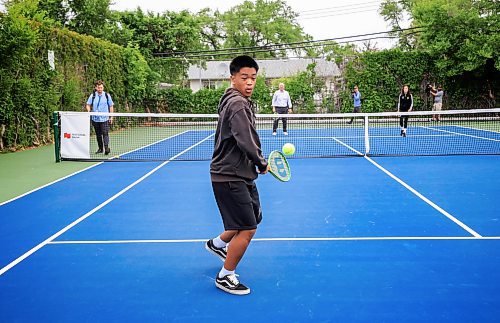 Ruth Bonneville / Free Press
STDUP - Garden City Collegiate tennis courts
Photo of Jacob Crisostomo as he tries to get the ball while playing against Mayor Scott Gillingham during a fun pick-up game after the ceremony Wednesday.
Mayor Scott Gillingham attends the opening ceremony held by Tennis Canada for the newly restored tennis courts at Garden City Collegiate as part of the National Bank Play Your Court Program on Wednesday.
After the ceremony the Mayor along with other dignitaries had some fun playing a quick pick up game of tennis with kids from HC Avery Middle School middle school.
More info: it was announced that the National Bank Play Your Court Program, an initiative aimed to help municipalities revitalize their outdoor public tennis courts, had selected Garden City Collegiate in Winnipeg, Manitoba, as one of four projects to receive funding to renovate their current facilities
June 25th, 2025