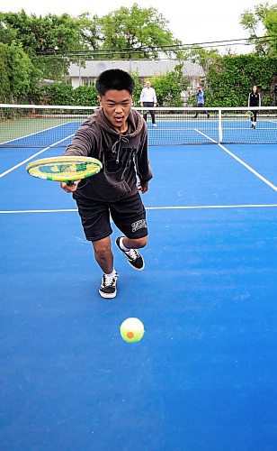 Ruth Bonneville / Free Press
STDUP - Garden City Collegiate tennis courts
Photo of Jacob Crisostomo as he tries to get the ball while playing against Mayor Scott Gillingham during a fun pick-up game after the ceremony Wednesday.
Mayor Scott Gillingham attends the opening ceremony held by Tennis Canada for the newly restored tennis courts at Garden City Collegiate as part of the National Bank Play Your Court Program on Wednesday.
After the ceremony the Mayor along with other dignitaries had some fun playing a quick pick up game of tennis with kids from HC Avery Middle School middle school.
More info: it was announced that the National Bank Play Your Court Program, an initiative aimed to help municipalities revitalize their outdoor public tennis courts, had selected Garden City Collegiate in Winnipeg, Manitoba, as one of four projects to receive funding to renovate their current facilities
June 25th, 2025