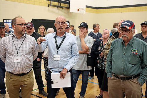 25062025
Donovan Toews, Managing Partner at Landmark Planning and Design, answers questions from concerned Carberry and area residents at the fourth community engagement meeting regarding the proposed RCUT modification to the Trans Canada Highway at the Highway 5 intersection at Carberry Collegiate on Wednesday evening.
(Tim Smith/The Brandon Sun)