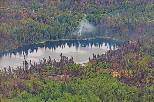 MIKE DEAL / FREE PRESS
Tour of the wildfire conditions around Flin Flon by helicopter.
Premier Wab Kinew takes a tour of the wildfires in northern Manitoba, making stops in Flin Flon and Thompson.
250612 - Thursday, June 12, 2025.