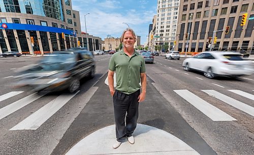 MIKE DEAL / FREE PRESS
Brent Bellamy at Portage Avenue and Main Street the day before the crosswalks are going to become active, allowing people to cross the famous intersection for the first time, legally, since 1979.
We have talked to several longtime proponents of opening Portage and Main as the iconic Winnipeg intersection prepares to welcome pedestrians Friday for the first time in nearly 50 years. Have talked to Glen Murray, Brent Bellamy, Loren Remillard and Adam Dooley. Will lead with Bellamy planning to walk across the intersection in a &#x2018;plebiscite&#x2019; T-shirt related to the referendum during Bowman administration.
Reporter: Massimo De Luca-Taronno
250626 - Thursday, June 26, 2025.