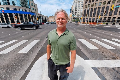 MIKE DEAL / FREE PRESS
Brent Bellamy at Portage Avenue and Main Street the day before the crosswalks are going to become active, allowing people to cross the famous intersection for the first time, legally, since 1979.
We have talked to several longtime proponents of opening Portage and Main as the iconic Winnipeg intersection prepares to welcome pedestrians Friday for the first time in nearly 50 years. Have talked to Glen Murray, Brent Bellamy, Loren Remillard and Adam Dooley. Will lead with Bellamy planning to walk across the intersection in a &#x2018;plebiscite&#x2019; T-shirt related to the referendum during Bowman administration.
Reporter: Massimo De Luca-Taronno
250626 - Thursday, June 26, 2025.