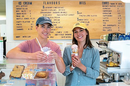 BROOK JONES/FREE PRESS
Teri-Lynn Friesen, 36, (left) holds Blueberry Lemon Crunch flavoured ice cream in a bowl while Élise Page, 37, holds BubbleGum flavoured ice cream in a homemade waffle cone as the co-owners of Fête Ice Cream &amp; Coffee co-owners are pictured at their storefront location at Unit B, 300 Assiniboine Ave. in Winnipeg, Man., Thursday, June 26, 2025.