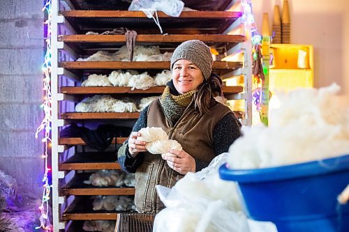 MIKAELA MACKENZIE / WINNIPEG FREE PRESS
Anna Hunter, co-director of Pembina Fibreshed, shows a skein of local wool at her mill east of Winnipeg on Tuesday, Dec. 6, 2022. For green page story.
Winnipeg Free Press 2022.