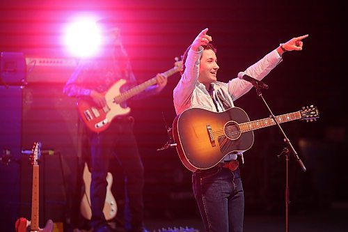 Drake Milligan of Texas performs for the crowd with his band on the main stage at Dauphin’s Countryfest 2025 south of Dauphin on a hot Friday evening. (Tim Smith/The Brandon Sun)