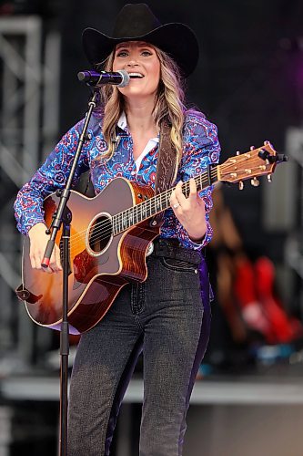 27062025
Kalsey Kulyk performs on the main stage at Dauphin&#x2019;s Countryfest 2025 south of Dauphin, Manitoba on a hot Friday evening. 
(Tim Smith/The Brandon Sun)
