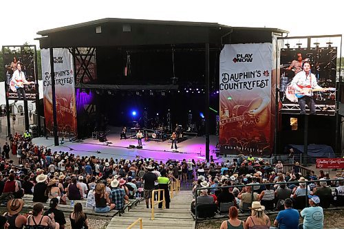 27062025
Drake Milligan of Texas performs for the crowd with his band on the main stage at Dauphin&#x2019;s Countryfest 2025 south of Dauphin, Manitoba on a hot Friday evening. 
(Tim Smith/The Brandon Sun)