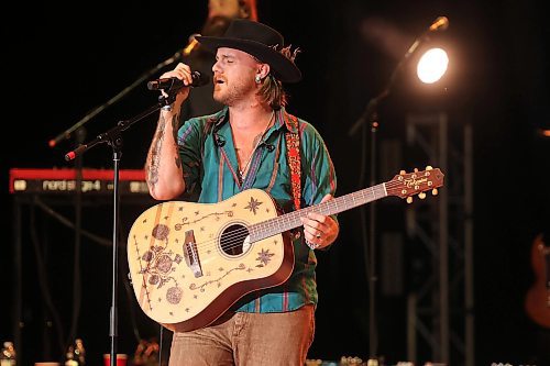 27062025
Jackson Dean performs with his band on the main stage at Dauphin’s Countryfest 2025 south of Dauphin, Manitoba on a hot Friday evening. Josh Ross headlined the main-stage later in the night.
(Tim Smith/The Brandon Sun)