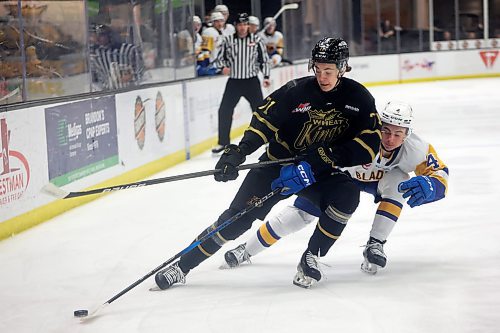 19032025
Brady Turko #71 of the Brandon Wheat Kings tries to keep the puck out of reach of Brayden Klimpke #4 of the Saskatoon Blades during WHL action at Westoba Place on Wednesday evening.
(Tim Smith/The Brandon Sun)