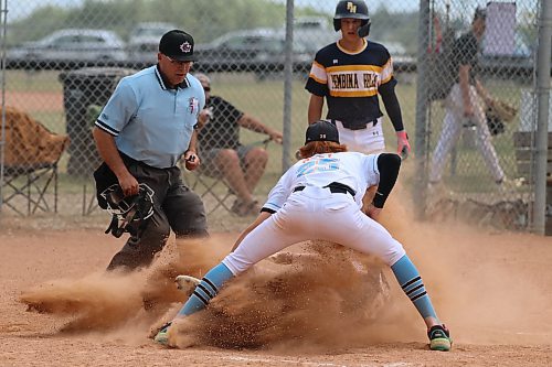 Brandon Marlins 15U AAA pitcher Aklen Abey tags out Pembina Hills baserunner Dawson Smart home in a cloud of dust and dirt in Sunday's game at the Triple Crown Canada Day tournament at Simplot Millennium Park. (Matt Packwood/The Brandon Sun) June 29, 2025