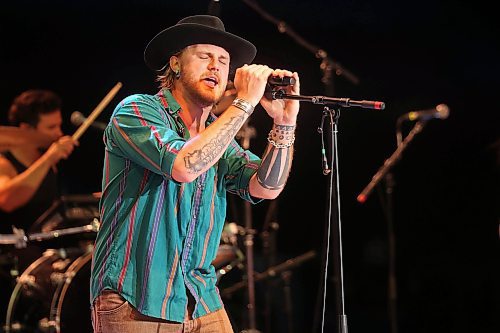 Jackson Dean performs with his band on the main stage at Dauphin’s Countryfest 2025 south of Dauphin, Manitoba on a hot Friday evening. Josh Ross headlined the main-stage later in the night. See Page A2 for more on Countryfest. (Tim Smith/The Brandon Sun)