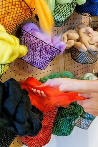 MIKE DEAL / FREE PRESS
Christie pulls some marino wool roving from a basket.
Christie Peters of Margaret Jane Design in her studio.
Christie Peters makes felted flowers and felted vases as well as wall hanging pieces.
Reporter: AV Kitching
250625 - Wednesday, June 25, 2025.
