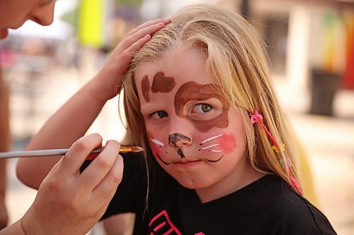 02072025
Novah (no last name given) has her face painted by Brooklyn Dickie with Promises Bridal, during the Downtown Summer Market on Rosser Avenue in Brandon on Wednesday afternoon. The market, organized by the Brandon Downtown Biz, featured local vendors, entertainment and games, food and other attractions. The afternoon/evening market will run every Wednesday on Rosser Avenue between 9th Street and 10th Street from July to September.
(Tim Smith/The Brandon Sun)
