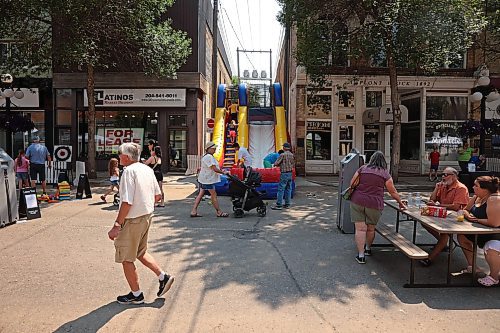 02072025
Brandonites explore the Downtown Summer Market on Rosser Avenue in Brandon on Wednesday afternoon. The market, organized by the Brandon Downtown Biz, featured local vendors, entertainment and games, food and other attractions. The afternoon/evening market will run every Wednesday on Rosser Avenue between 9th Street and 10th Street from July to September.
(Tim Smith/The Brandon Sun)