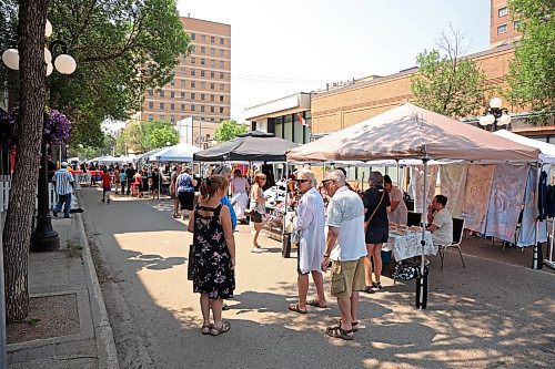 02072025
Brandonites explore the Downtown Summer Market on Rosser Avenue in Brandon on Wednesday afternoon. The market, organized by the Brandon Downtown Biz, featured local vendors, entertainment and games, food and other attractions. The afternoon/evening market will run every Wednesday on Rosser Avenue between 9th Street and 10th Street from July to September.
(Tim Smith/The Brandon Sun)