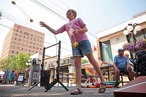 02072025
Ten-year-old Tryss Juri of Brandon plays ladder golf during the Downtown Summer Market on Rosser Avenue in Brandon on Wednesday afternoon. The market, organized by the Brandon Downtown Biz, featured local vendors, entertainment and games, food and other attractions. The afternoon/evening market will run every Wednesday on Rosser Avenue between 9th Street and 10th Street from July to September.
(Tim Smith/The Brandon Sun)