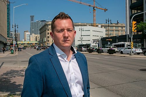 BROOK JONES/FREE PRESS
Matthew Cutler, 40, has been named the new president and CEO of United Way Winnipeg and will begin he new role Aug. 11, 2025. Cutler was pictured at Balmoral Street and Portage Avenue with downtown Winnipeg, Man., in the background Wednesday, July 2, 2025.