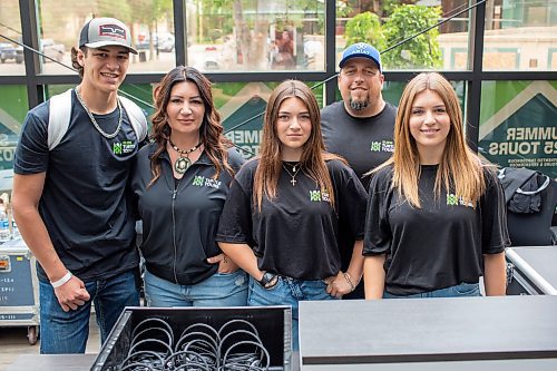 BROOK JONES/FREE PRESS
The Forks Market is now home to a new discovery space called Explore Indigenous which also houses Turtle Tours, an indigenous-owned storytelling and culinary experience operated by Ashley Smith. Smith (second from far left) is pictured with her husband Jason Smith (second from far right), and their son Keeson Smith (left), and their daughters Dawnjae Smith (middle) and Jaylee Smith (right), in the discovery space at The Forks Market in Winnipeg, Man., Friday, July 4, 2025.