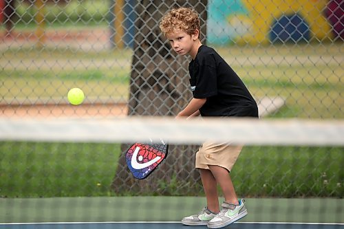 07072025
Maksim Braun plays pickleball with his sister Shiloh and his grandfather at the Stanley Park pickleball courts while visiting Brandon from California on a cool and overcast Monday.
(Tim Smith/The Brandon Sun)