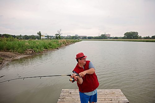 07072025
Ryan Houston fishes the Assiniboine River from the dock at Dinsdale Park on a cool and overcast Monday.
(Tim Smith/The Brandon Sun)