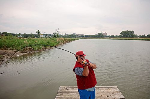 07072025
Ryan Houston fishes the Assiniboine River from the dock at Dinsdale Park on a cool and overcast Monday.
(Tim Smith/The Brandon Sun)