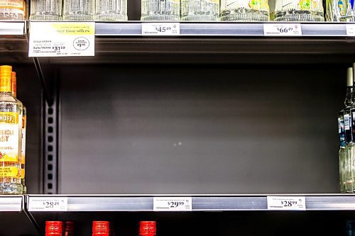 MIKAELA MACKENZIE / FREE PRESS
Shelves emptied of American alcohol at the Seasons of Tuxedo Liquor Mart at Kenaston and Sterling Lyon on Tuesday, March 4, 2025. The province has pulled American booze off the shelves as a tariff retaliation measure.
For Carol story.
Winnipeg Free Press 2025