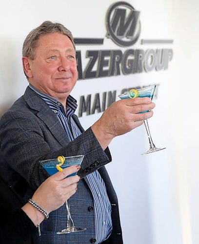 Mazergroup president and CEO Bob Mazer makes a toast in honour of Assiniboine Community College naming a portion of the Len Evans Centre for Trades and Technology after his company in 2022. Mazer passed away Sunday at the age of 75. (Ian Hitchen/The Brandon Sun files)