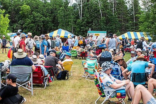 MIKAELA MACKENZIE / FREE PRESS
	
Lineups stretch far past the entrance before the gates open at Folk Fest on Thursday, July 10, 2025. 

For folk fest story.
Winnipeg Free Press 2025